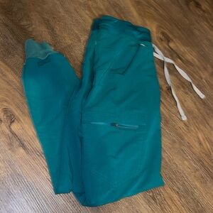Lightly worn green figs jogger bottoms